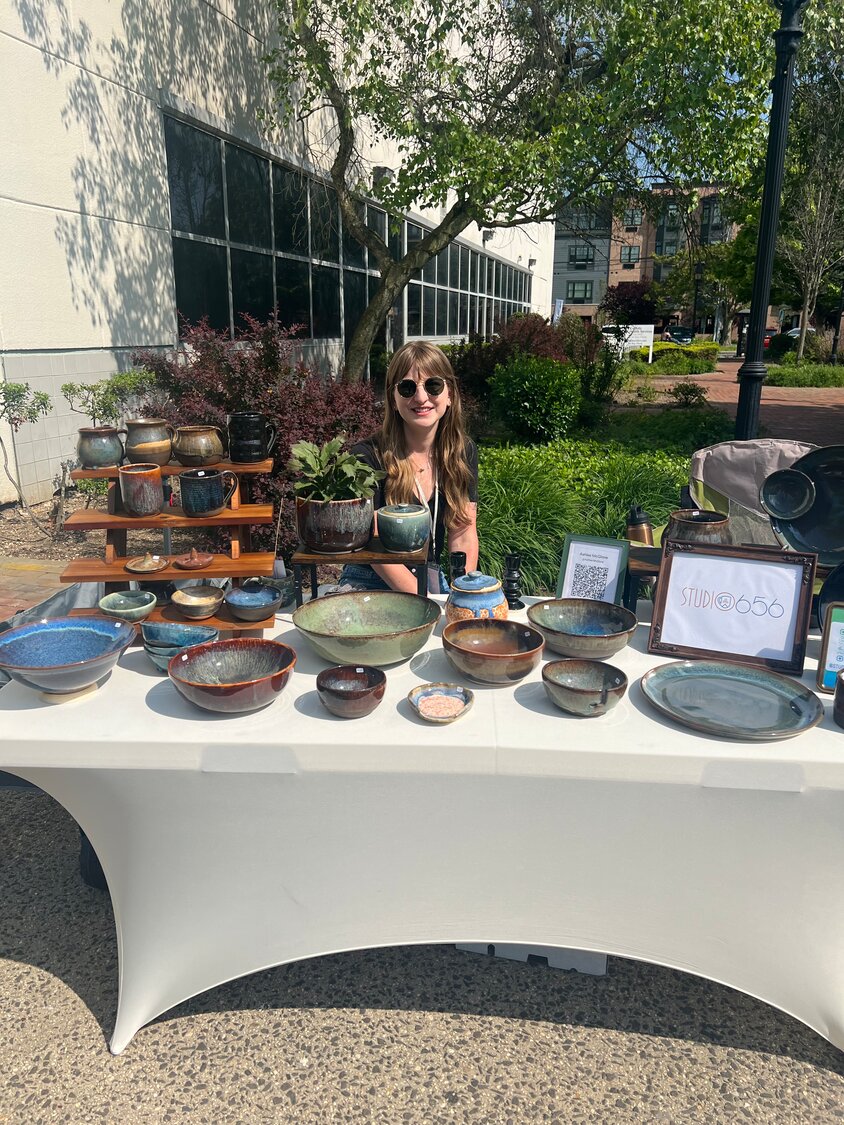 Ashlee McGlone came to the Art Crawl with her mugs, bowls, and other functional pieces of art, which she glazes herself and often gives as gifts to her friends as well as selling to customers.